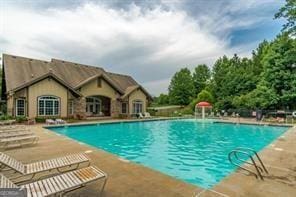 community pool featuring a patio