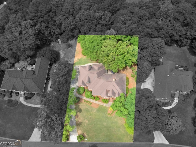 bird's eye view featuring a forest view