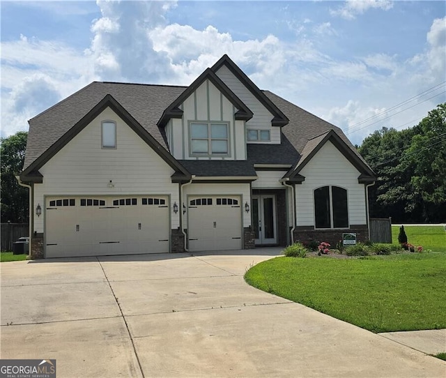 3000 Keeneland Blvd, Mcdonough, GA 30252 - view of front of home with driveway, a front lawn, roof with shingles, and a garage
