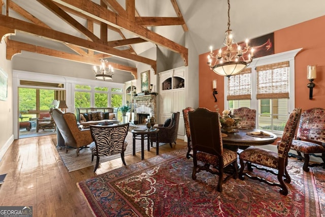 533 Birch River Dr Unit 17, Dahlonega, GA 30533 - dining space featuring a chandelier, hardwood / wood-style floors, beam ceiling, high vaulted ceiling, and baseboards