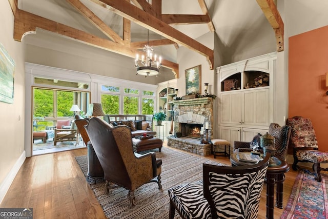 533 Birch River Dr Unit 17, Dahlonega, GA 30533 - living area featuring high vaulted ceiling, hardwood / wood-style floors, a chandelier, beam ceiling, and a fireplace
