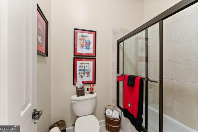 533 Birch River Dr Unit 17, Dahlonega, GA 30533 - bathroom with toilet, baseboards, and bath / shower combo with glass door
