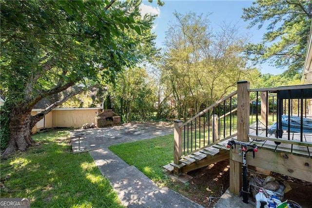 view of yard featuring stairway