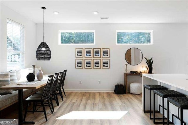 4856 Allatoona Unit 8, Acworth, GA 30101 - dining area featuring baseboards, visible vents, and light wood-type flooring