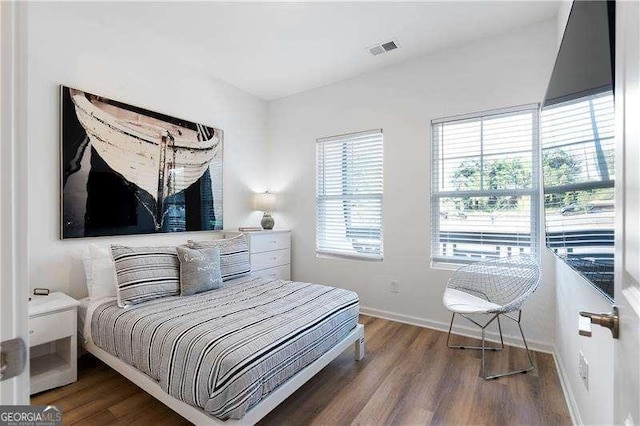 4856 Allatoona Unit 8, Acworth, GA 30101 - bedroom with visible vents, wood finished floors, and baseboards
