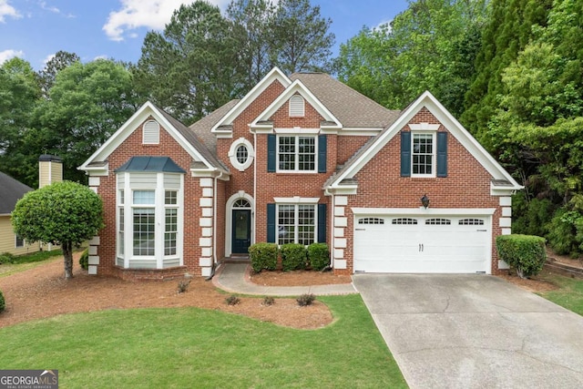 view of front of house with a garage, a front lawn, brick siding, and driveway