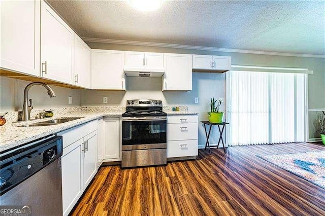 kitchen with a sink, stainless steel appliances, white cabinetry, dark wood finished floors, and a textured ceiling