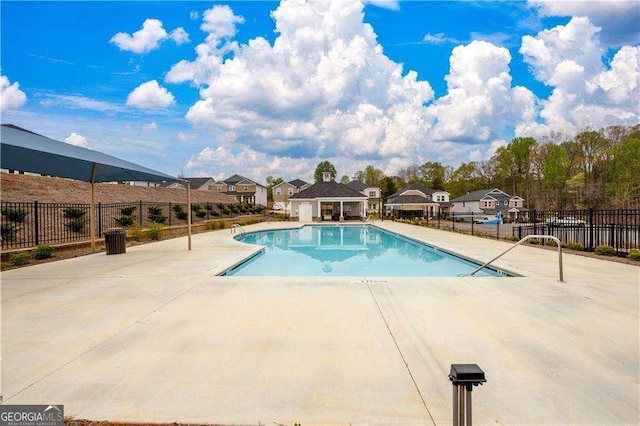 5958 Green Ash Ct, Braselton, GA 30517 - community pool with a patio area and a residential view