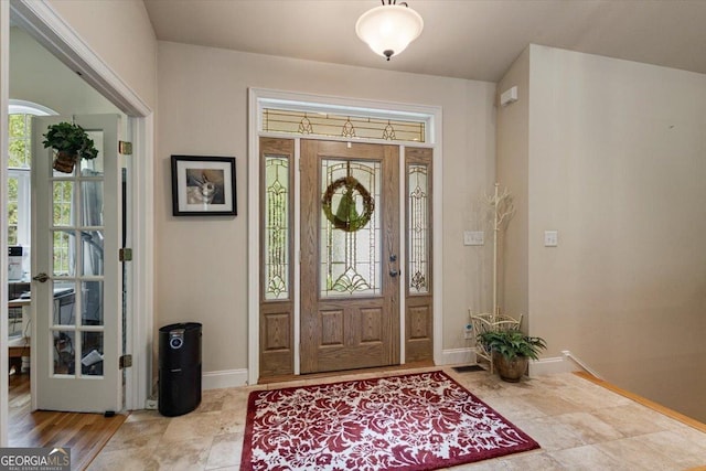 foyer with baseboards