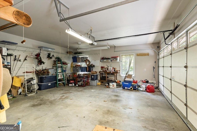 garage featuring a garage door opener