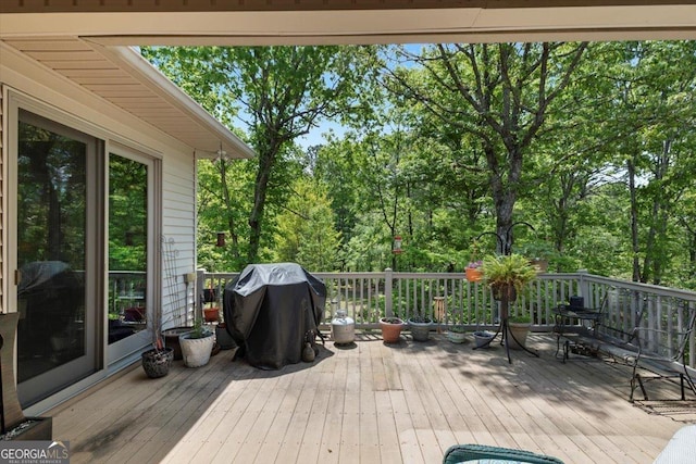 deck featuring a grill