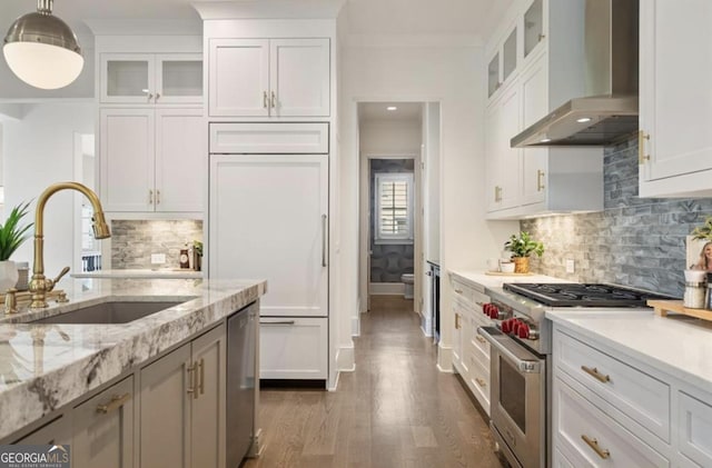 210 Marjean Way, Alpharetta, GA 30009 - kitchen featuring high end appliances, wall chimney range hood, a sink, white cabinetry, and crown molding