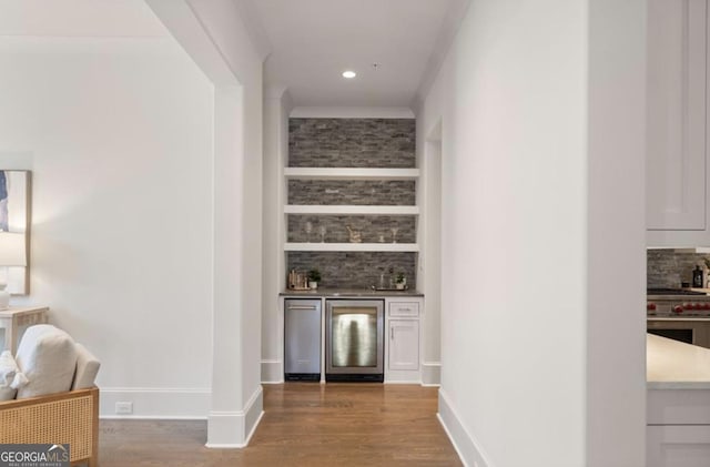210 Marjean Way, Alpharetta, GA 30009 - indoor bar featuring wine cooler, wood finished floors, decorative backsplash, recessed lighting, and baseboards
