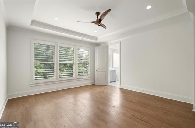 210 Marjean Way, Alpharetta, GA 30009 - spare room featuring a raised ceiling, crown molding, ceiling fan, baseboards, and wood finished floors