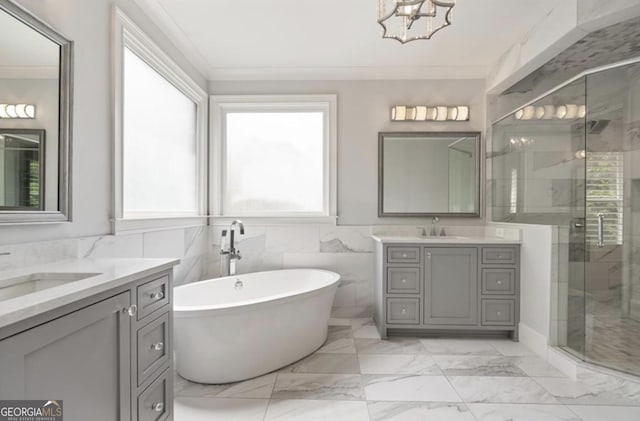 210 Marjean Way, Alpharetta, GA 30009 - bathroom with a shower stall, marble look tile flooring, a soaking tub, two vanities, and a chandelier