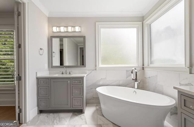 210 Marjean Way, Alpharetta, GA 30009 - bathroom featuring tile walls, a soaking tub, vanity, crown molding, and marble finish floors