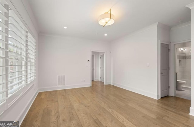 210 Marjean Way, Alpharetta, GA 30009 - spare room featuring light wood-style flooring, baseboards, ornamental molding, and recessed lighting