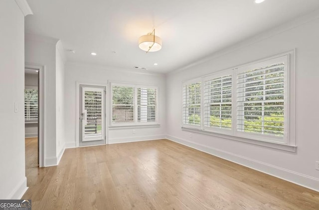 210 Marjean Way, Alpharetta, GA 30009 - spare room with crown molding, baseboards, wood finished floors, and recessed lighting