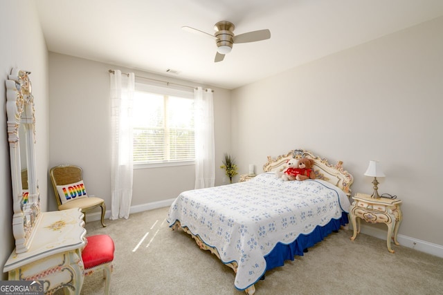 bedroom featuring carpet floors, baseboards, and a ceiling fan