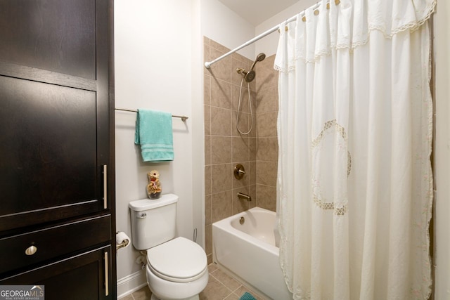 bathroom featuring tile patterned floors, toilet, and shower / bath combination with curtain