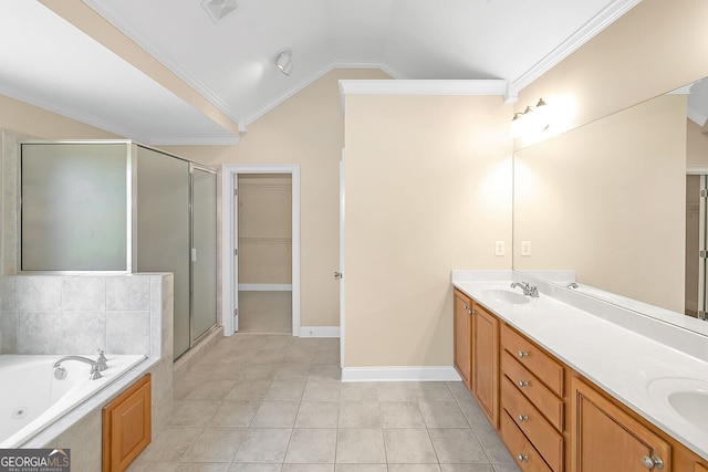 full bath with a sink, visible vents, vaulted ceiling, a stall shower, and double vanity