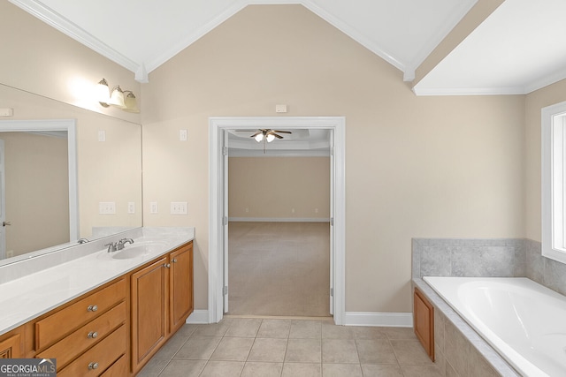 bathroom with a garden tub, crown molding, tile patterned flooring, baseboards, and vanity