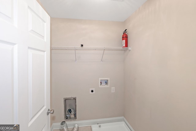 washroom featuring laundry area, hookup for an electric dryer, and hookup for a washing machine