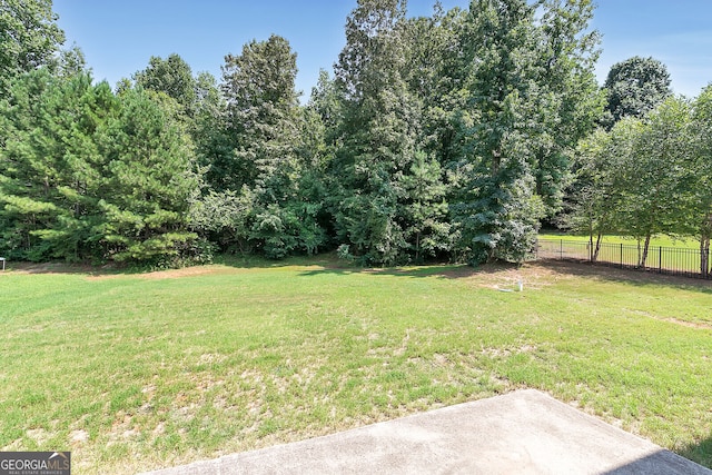 view of yard featuring fence