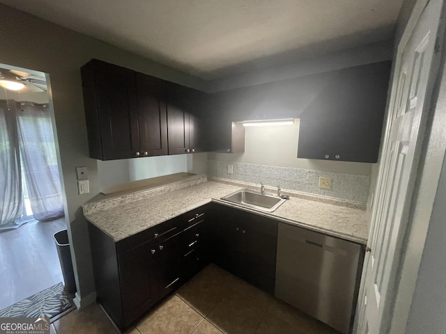 kitchen with a sink, dishwasher, tile patterned flooring, light countertops, and a ceiling fan
