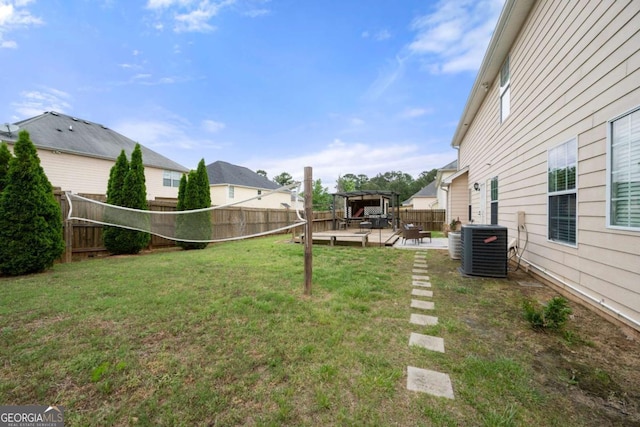 view of yard with cooling unit, a patio, and a fenced backyard