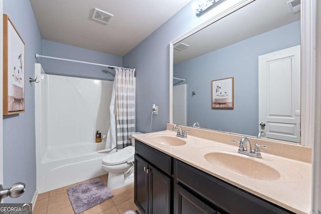 bathroom featuring shower / bath combination with curtain, toilet, tile patterned flooring, and a sink