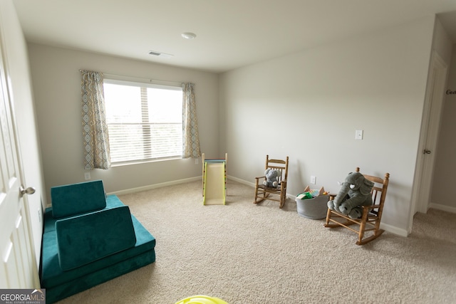 8045 Coleson Xing, Locust Grove, GA 30248 - sitting room with carpet flooring and baseboards