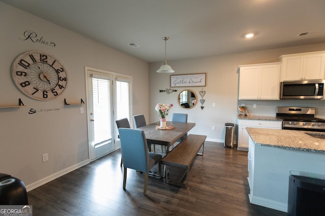 8045 Coleson Xing, Locust Grove, GA 30248 - dining room with dark wood-style floors, baseboards, and recessed lighting