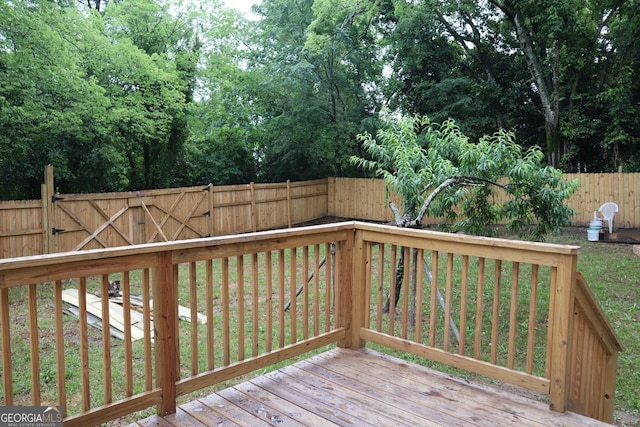 deck featuring a fenced backyard
