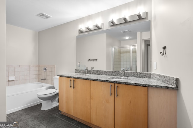 bathroom with a stall shower, tile patterned floors, visible vents, and a sink