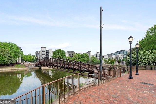 view of home's community featuring a water view