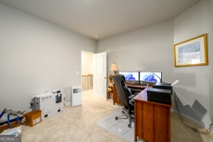 view of carpeted home office