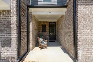 entrance to property with brick siding