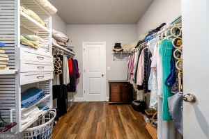 spacious closet with wood finished floors