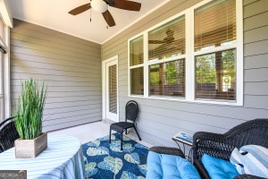 view of patio with a ceiling fan, a porch, and an outdoor hangout area