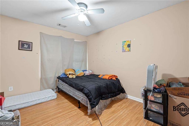 2171 Wilson Ave NW, Atlanta, GA 30314 - bedroom with baseboards, visible vents, wood finished floors, and a ceiling fan