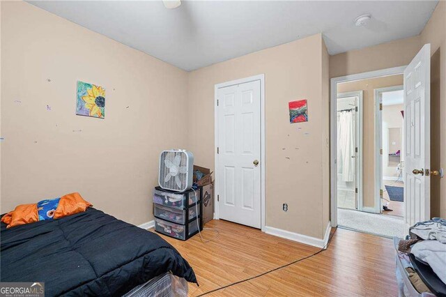 2171 Wilson Ave NW, Atlanta, GA 30314 - bedroom with light wood-type flooring and baseboards