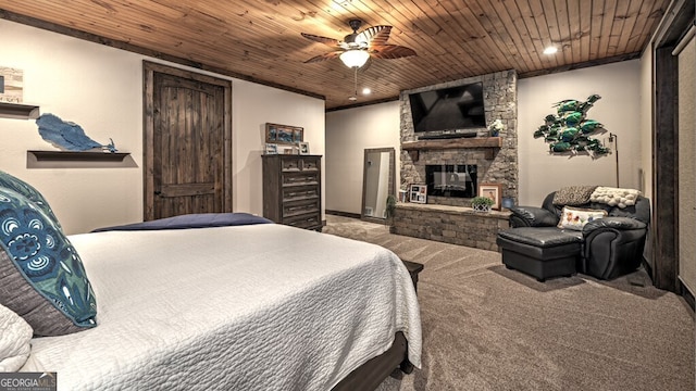 bedroom featuring a stone fireplace, carpet flooring, recessed lighting, and wooden ceiling