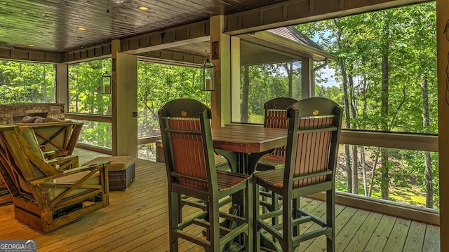 sunroom / solarium featuring a wealth of natural light