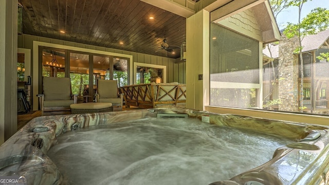 exterior space featuring a jacuzzi