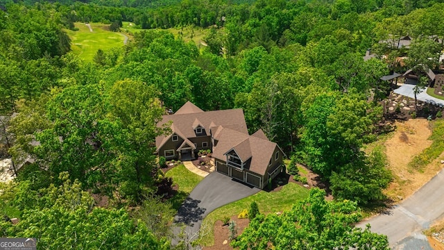 drone / aerial view with a forest view