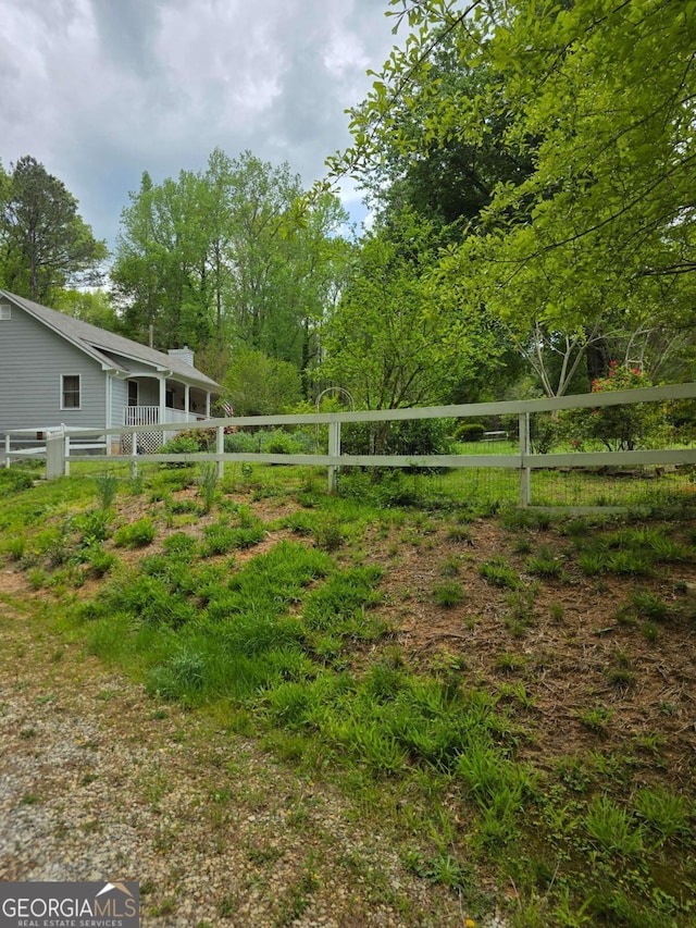 1180 Edwards Mill Rd, Ball Ground, GA 30107 - view of yard with fence private yard
