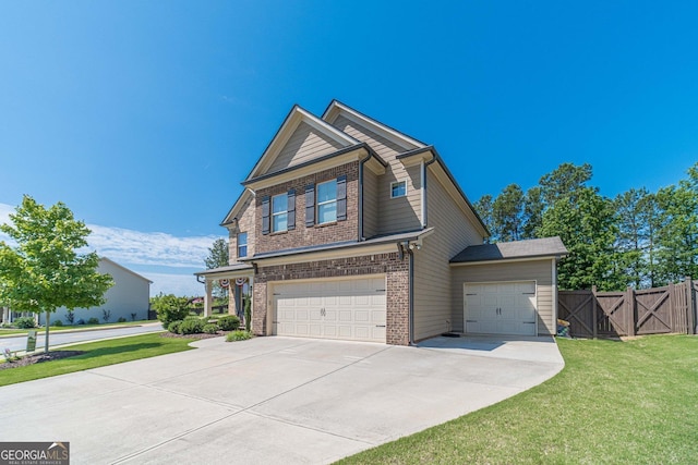 116 Blue Billed Xing, Jefferson, GA 30549 - view of front of home featuring brick siding, an attached garage, and concrete driveway