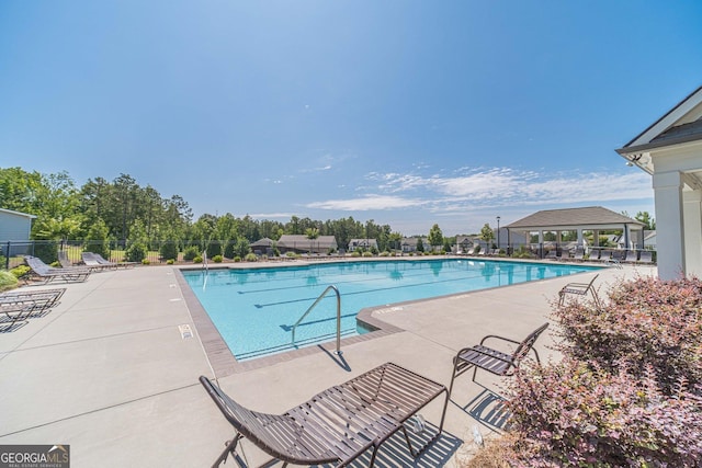 116 Blue Billed Xing, Jefferson, GA 30549 - community pool with a gazebo and a patio area