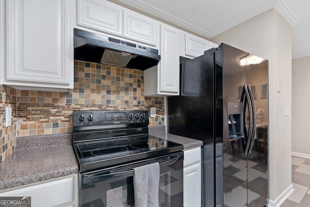 kitchen featuring under cabinet range hood, tasteful backsplash, ornamental molding, black appliances, and white cabinets